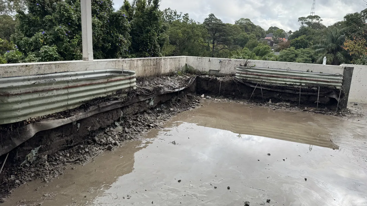 Deck during remedial works, with planter boxes being removed