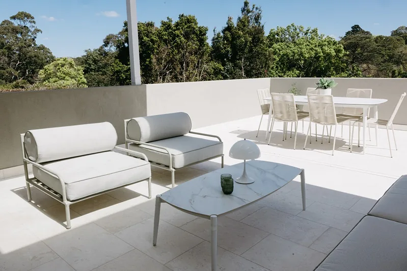 Completed retiled rear deck with outdoor seating