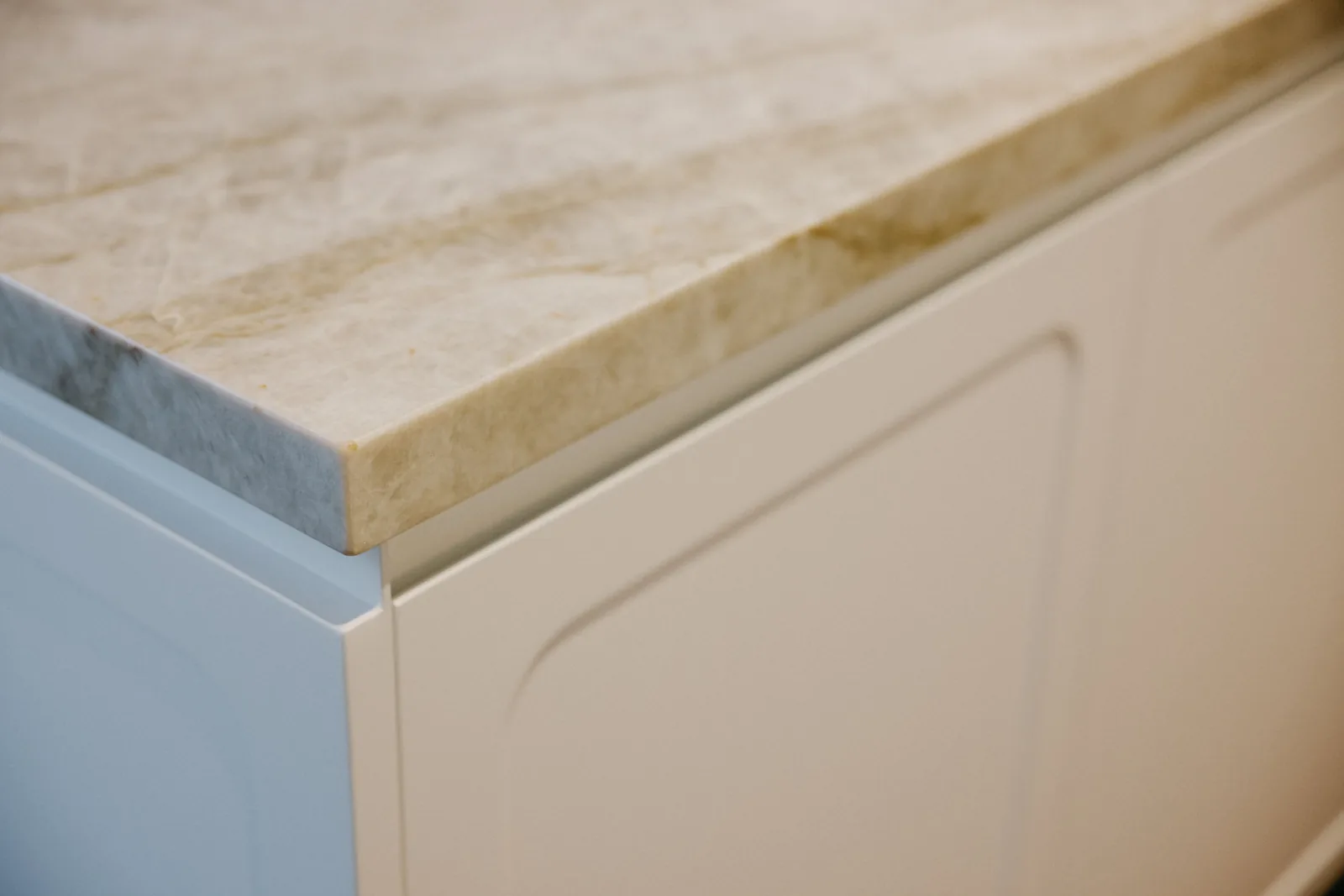 Taj Mahal stone edge above arched joinery panel