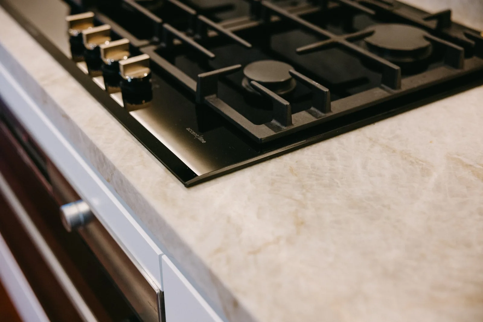 Stone benchtop beside the cooktop